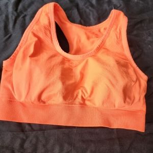 Neon orange sports bra